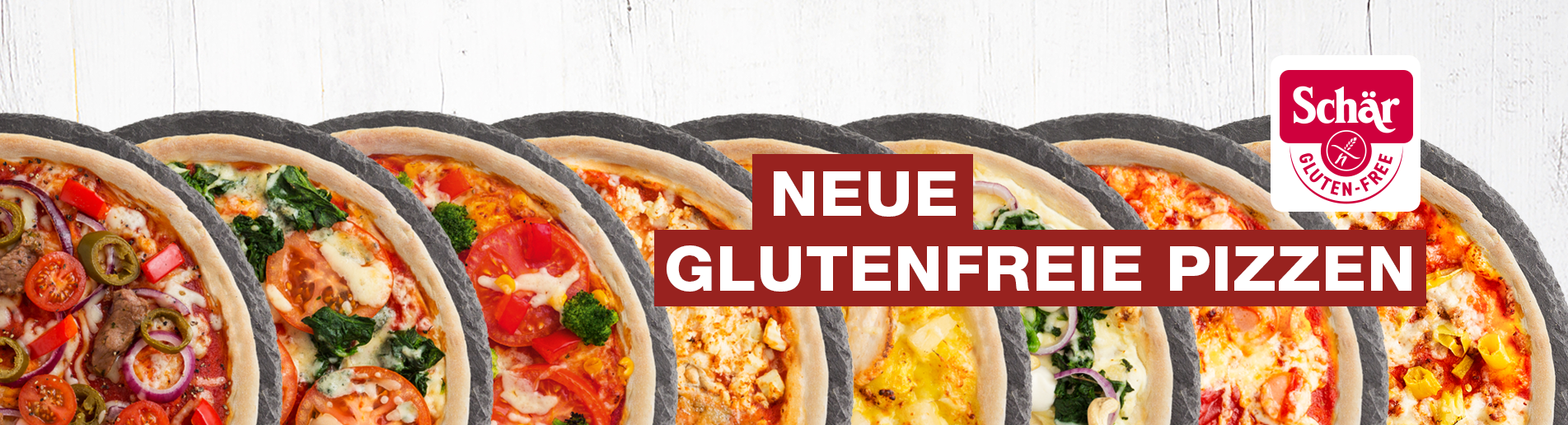 Eine Gruppe von Pizzen mit der Aufschrift „Neue glutenfreie Pizza“.
